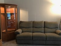Sofa and Gun Cabinet