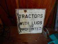 "Tractors with Lugs Prohibited" Embossed Steel Sign