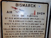 81 - BISMARCK AIR SHOW EMBOSSED STEEL SIGN, 18" X 18"
