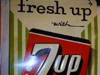 83 - 7-UP EMBOSSED TIN SIGN, 13" X 19"