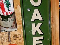 131 - QUAKER STATE OIL VERTICAL SIGN, EMBOSSED TIN, 12" X 75"; 132 - FRAM FILTERS THERMOMETER, NO GLASS, 7" X 38"