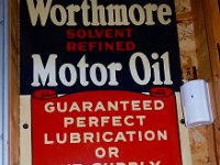 141 - WORTHMORE MOTOR OIL SIGN, SST, 17" X 35"