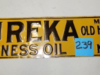 239 - EUREKA HARNESS OIL SST SIGN, 5" X 19"