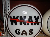 310 - WNAX GAS GLOBE, GLASS BODY, 13.5" LENS