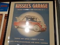 407 - KISSEL'S GARAGE TOWING POSTER, FRAMED