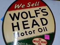 441 - WOLF'S HEAD MOTOR OIL DST SIGN IN FRAME, NO POST OR STAND