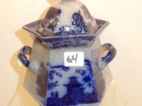 64 - FLOW BLUE COVERED JAR